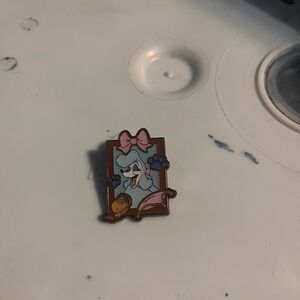 Cute Cartoon Character Pin with Pink and Blue Accents